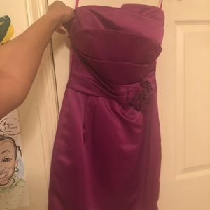 Purple Dress with Floral Adornment